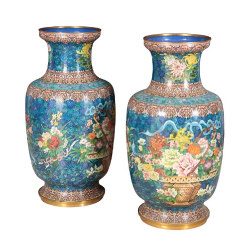 125 - A PAIR OF MONUMENTAL JAPANESE CLOISONNE VASES Meiji or later, decorated with urns of chrysanthemums ... 