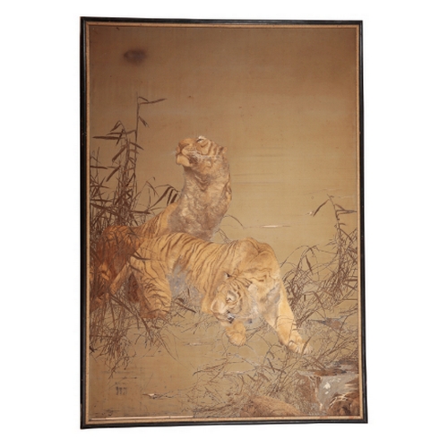 128 - A MONUMENTAL JAPANESE SILK WORK PANEL Meiji, embroidered with tigers in a landscape on a silk ground... 