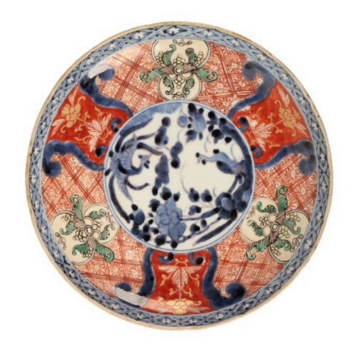 132 - A JAPANESE IMARI DISH Edo, of circular form with moulded rim, decorated in underglaze blue, iron-red... 