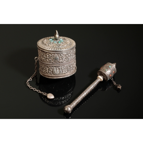 137 - A TIBETAN SILVER PRAYER WHEEL 19th century, with filigree decoration inset with turquoise and coral,... 