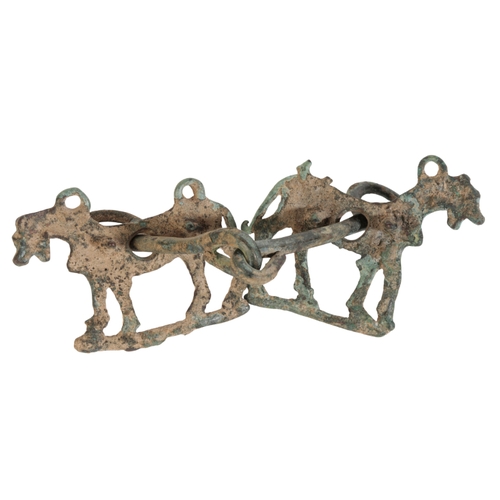 141 - A LURISTAN BRONZE HORSE BIT AND CHEEK PIECES each modelled as a standing horse, 8th/7th century BC.
... 