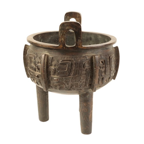 22 - A CHINESE BRONZE TRIPOD DING inscribed on the rim 