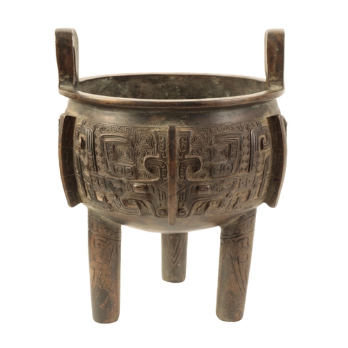 22 - A CHINESE BRONZE TRIPOD DING inscribed on the rim 