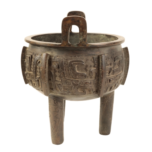 22 - A CHINESE BRONZE TRIPOD DING inscribed on the rim 