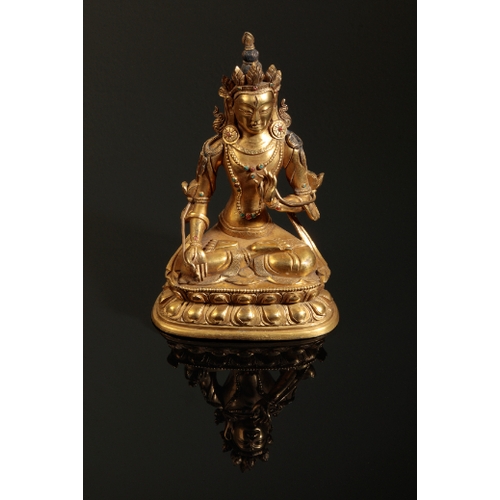 31 - A SINO-TIBETAN GILT BRONZE OF MAITREYA 18th century, finely cast seated in Dhyanasana on double lotu... 