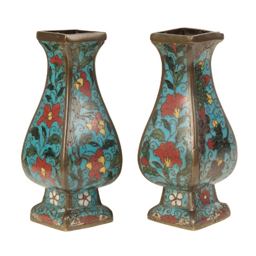 34 - A PAIR OF CHINESES CLOISONNE SQUARE VASES late Ming, of baluster form decorated with flowers on a bl... 