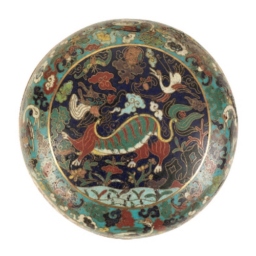 35 - A CHINESE CLOISONNE BOX AND COVER late Ming/early Qing, decorated with a qilin amidst clouds within ... 