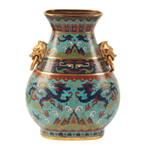 36 - A FINE CHINESE CLOISONNE HU-SHAPED VASE with gilt lion mask and loose ring handles, decorated with g... 