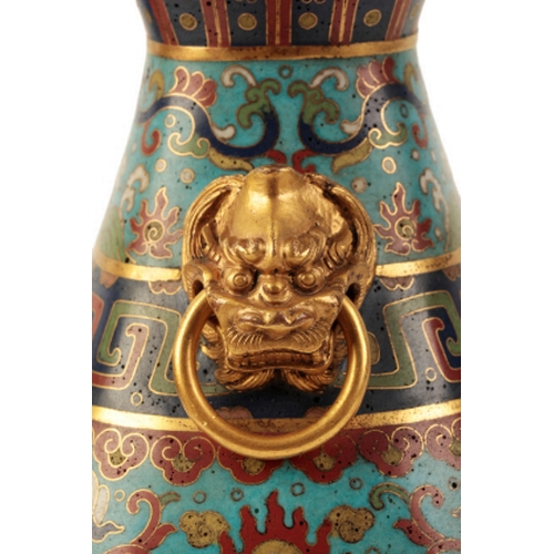 36 - A FINE CHINESE CLOISONNE HU-SHAPED VASE with gilt lion mask and loose ring handles, decorated with g... 