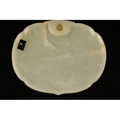 54 - A CHINESE CELADON JADE RUYI SCEPTRE PANEL Qing or later, of convex shaped oval form carved with a ce... 