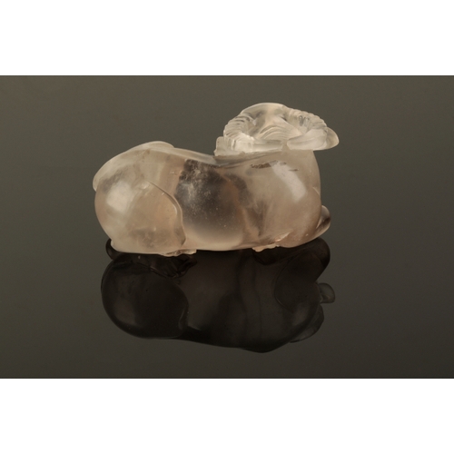 59 - A CHINESE ROCK CRYSTAL BUFFALO probably Qing, the recumbent beast modelled with head turned, 15cm lo... 