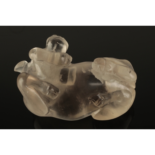 59 - A CHINESE ROCK CRYSTAL BUFFALO probably Qing, the recumbent beast modelled with head turned, 15cm lo... 