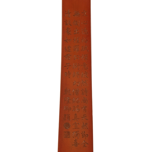 67 - A FINE CARVED WOOD RUYI SCEPTRE decorated at the head with a stylised bat, the reverse incised with ... 