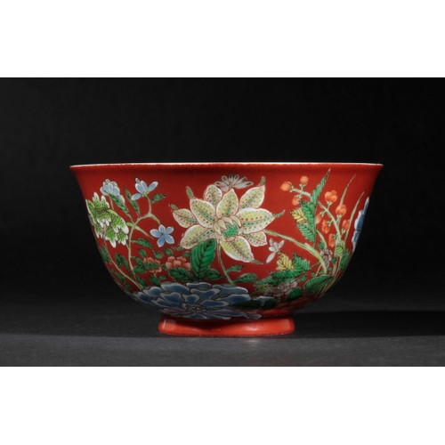 84 - A FINE CHINESE CORAL-GROUND BOWL the exterior vividly painted with flowers in polychrome enamels on ... 