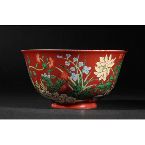 84 - A FINE CHINESE CORAL-GROUND BOWL the exterior vividly painted with flowers in polychrome enamels on ... 