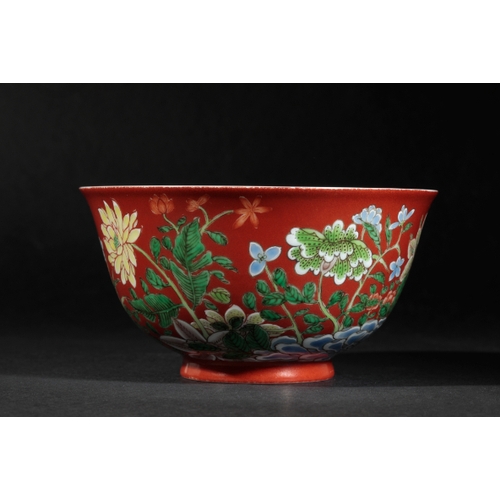 84 - A FINE CHINESE CORAL-GROUND BOWL the exterior vividly painted with flowers in polychrome enamels on ... 