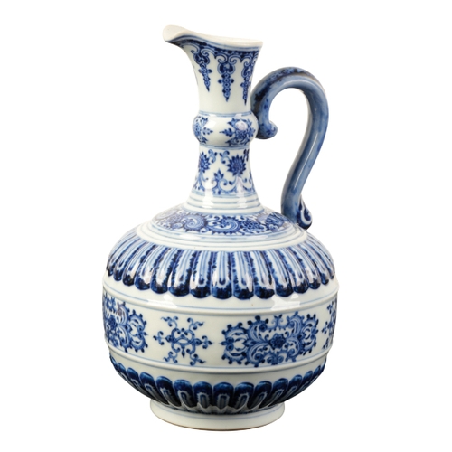 86 - A CHINESE BLUE AND WHITE EWER of Iznic form painted in shades of intense blue with scroll work and s... 