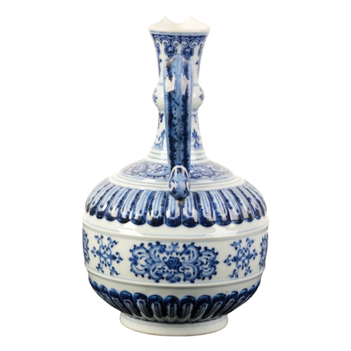 86 - A CHINESE BLUE AND WHITE EWER of Iznic form painted in shades of intense blue with scroll work and s... 