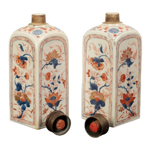 96 - A PAIR OF CHINESE 'IMARI' CANISTERS early Qing, painted with panels of flowers within diaper zig-zag... 