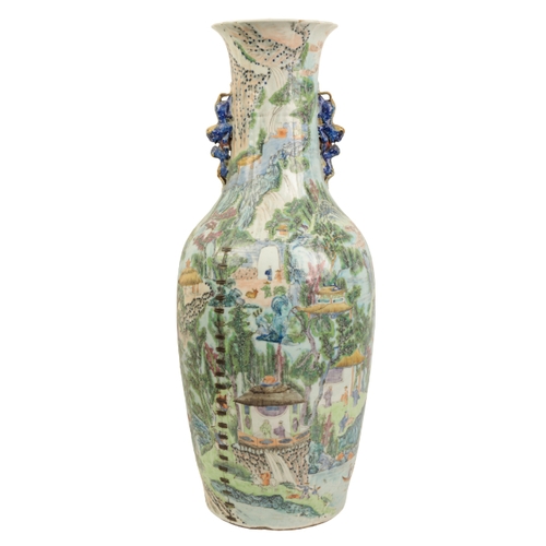 98 - A LARGE CANTONESE FAMILLE VERTE VASE Qing, with lion handles and the neck moulded to simulate folds ... 