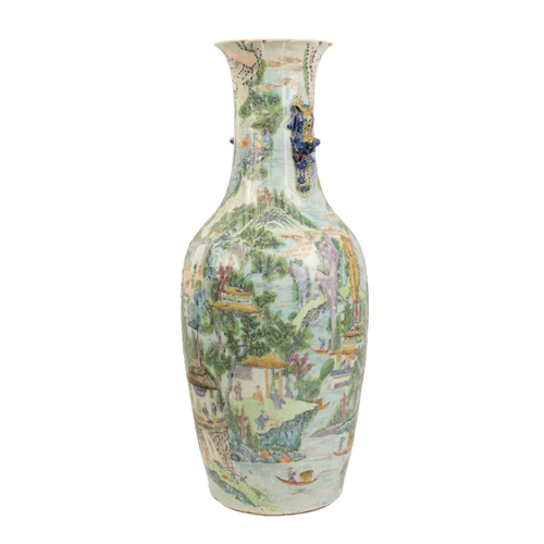 98 - A LARGE CANTONESE FAMILLE VERTE VASE Qing, with lion handles and the neck moulded to simulate folds ... 