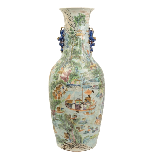 98 - A LARGE CANTONESE FAMILLE VERTE VASE Qing, with lion handles and the neck moulded to simulate folds ... 