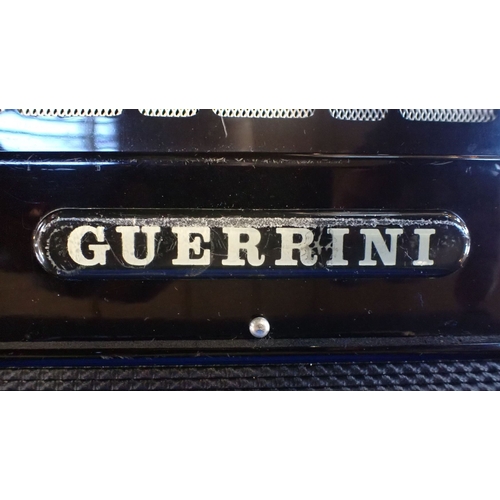 202 - A GUERRINI RAMONA QUATTRO ACCORDION cased