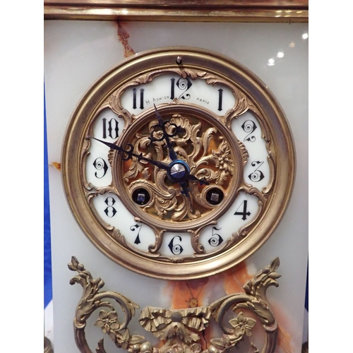 211 - A FRENCH ONYX AND GILT METAL MOUNTED MANTEL CLOCK the dial with Arabic numerals, inscribed 'H Ashton... 