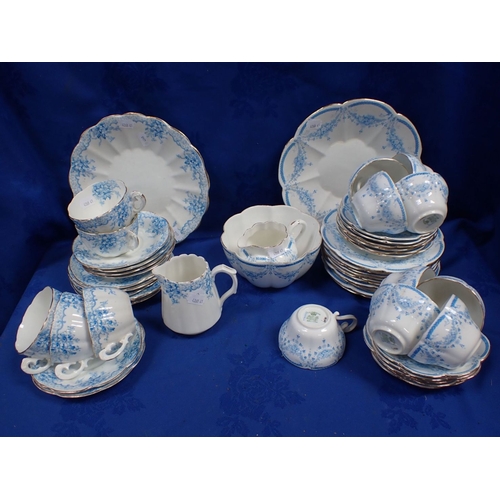 222 - A FOLEY CHINA (PRE-SHELLEY) PART TEA SERVICE decorated with swags (some damage), and a similar unmar... 