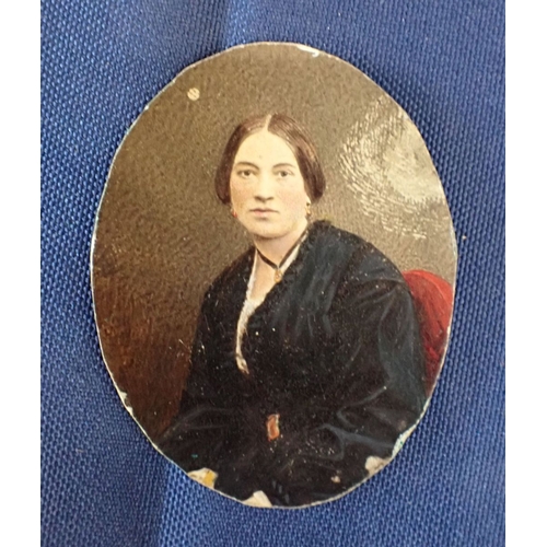 512 - MINIATURE WATERCOLOUR PORTRAIT IN A LEATHER CASE dated 1862, with a small oval cased Daguerrotype ph... 