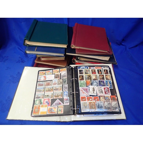 535 - A COLLECTION OF WORLD STAMPS in albums