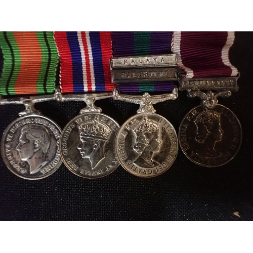 539 - A GROUP OF FOUR WWII MINIATURE DRESS MEDALS comprising War, Defence, GSM with two bars (Malaya and P... 