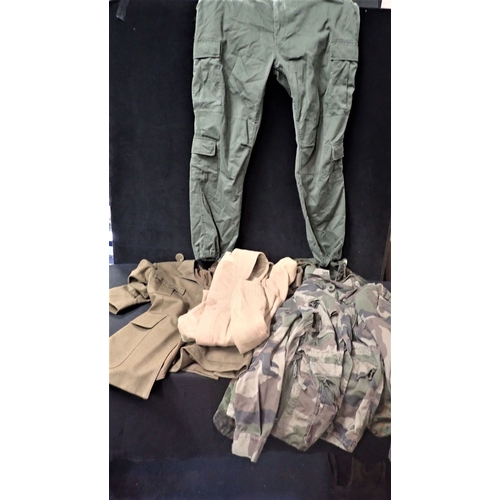 551 - A BOX OF MILITARY UNIFORMS