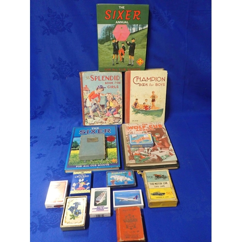 564 - A QUANTITY OF VINTAGE PLAYING CARDS Scout and Cubs Annuals and a box of stamped envelopes