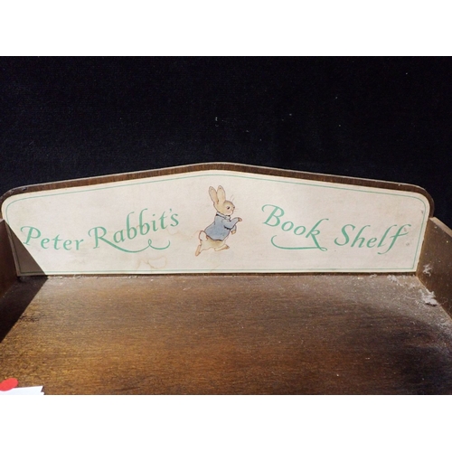 573 - BEATRIX POTTER: PETER RABBIT'S BOOK SHELF with volumes no. 1 - 20 and 23, and two other odd vols.