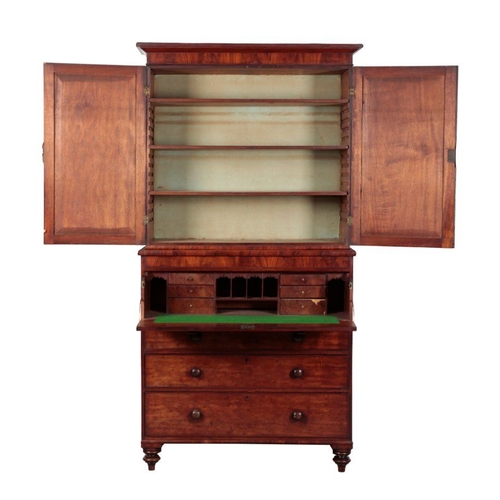 695 - AN EARLY VICTORIAN MAHOGANY SECRETAIRE BOOKCASE the (associated) top section with cornice over figur... 