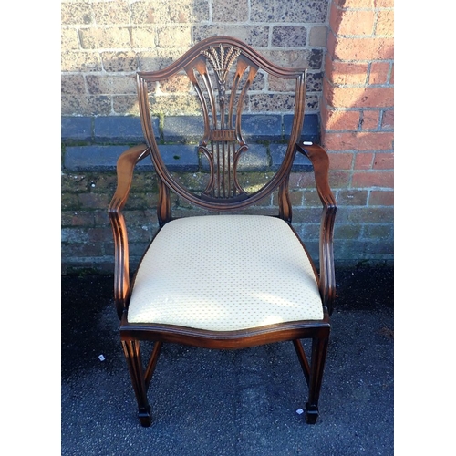 709 - A SET OF EIGHT MAHOGANY HEPPLEWHITE STYLE DINING CHAIRS 20th century, including two carvers, each wi... 