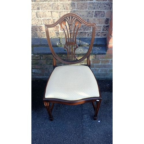 709 - A SET OF EIGHT MAHOGANY HEPPLEWHITE STYLE DINING CHAIRS 20th century, including two carvers, each wi... 