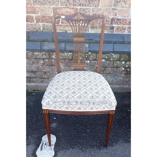 745 - A PAIR OF EDWARDIAN MAHOGANY SIDE CHAIRS with wavy top rails and pierced and inlaid splats