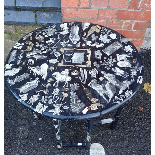 749 - A PAINTED AND DECOUPAGED GATELEG OCCASIONAL TABLE 59cm wide