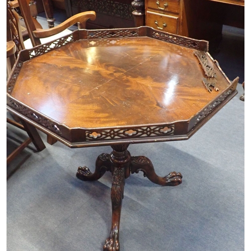 755 - AN 18TH CENTURY STYLE MAHOGANY TILT-TOP TABLE the octagonal top with pierced gallery (damaged), on t... 