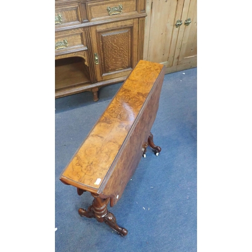 760 - A VICTORIAN FIGURED WALNUT SUTHERLAND TABLE with serpentine moulded top on turned supports 90cm wide