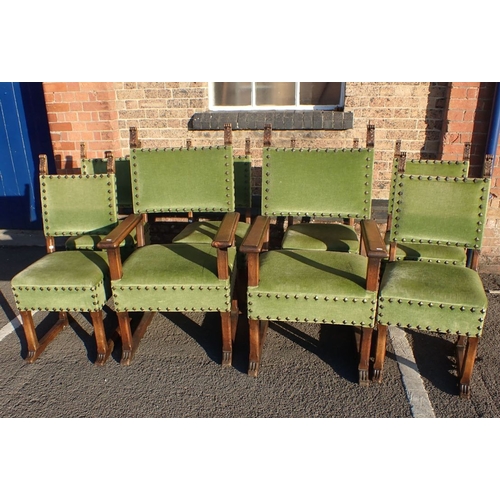 765 - A SET OF EIGHT CONTINENTAL 17TH CENTURY STYLE OAK DINING CHAIRS all on sledge stretchers and with ca... 