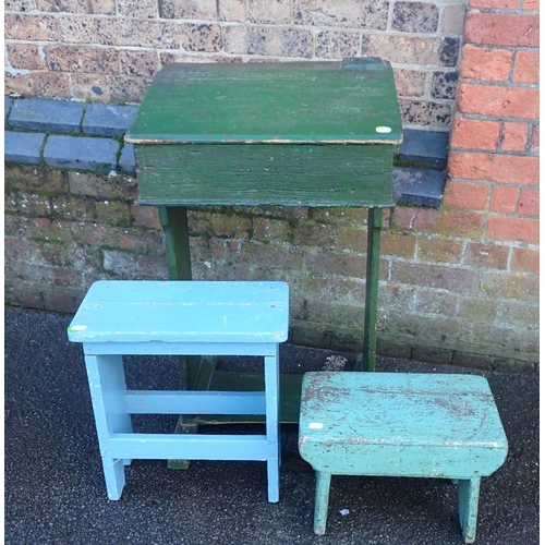 797 - A 19TH CENTURY GREEN-PAINTED PINE SCHOOL DESK and two painted plank stools (3)