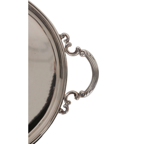 1 - A STERLING SILVER TRAY BY CARTIER with moulded rim and scroll and reeded handles, stamped and number... 