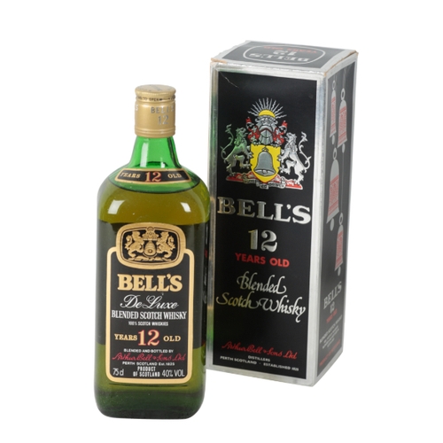 134 - BELLS: A BOXED 75CL BOTTLE OF 12 Y.O. BLENDED SCOTCH WHISKY three other bottles of blended Scotch wh... 