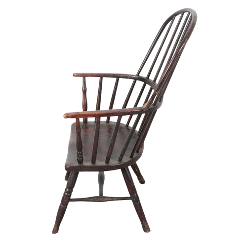 173 - A STAINED AND PAINTED WOOD WINDSOR ARMCHAIR 19th century, the hoop back above a shaped seat, on turn... 