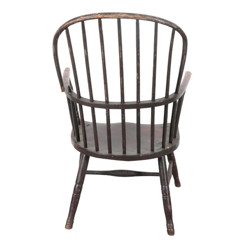 173 - A STAINED AND PAINTED WOOD WINDSOR ARMCHAIR 19th century, the hoop back above a shaped seat, on turn... 