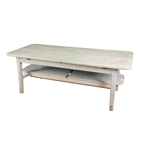 177 - A PAINTED DINING TABLE with a low shelf that extends towards each end, 74cm high x 206cm wide x 90cm... 