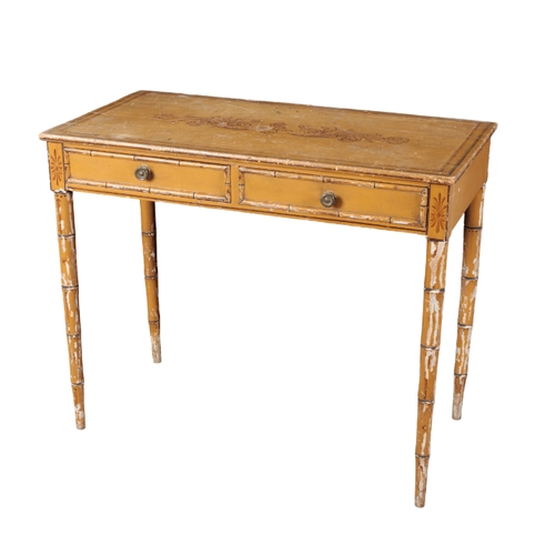 185 - A BAMBOO EFFECT SIDE TABLE the painted top over two frieze drawers, on turned and tapering legs, 77c... 